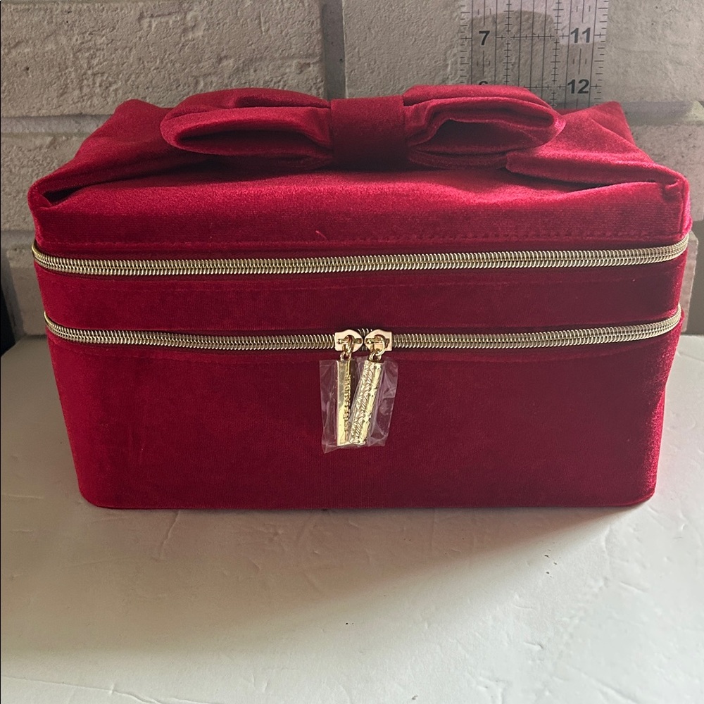 Elegant Red Velvet Makeup Bag by Estée Lauder